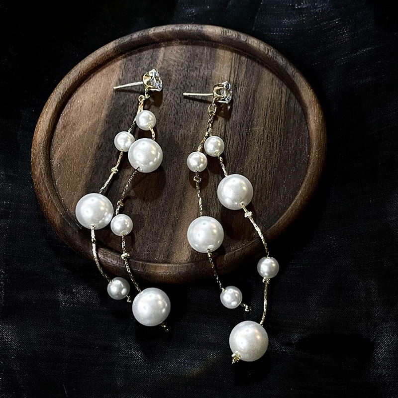 科技與時(shí)尚完美融合，最新長(zhǎng)款珍珠耳飾款式亮相！